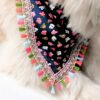 Golden Retriever wearing the Flora Fiesta Limited Edition handmade floral pet bandana with colorful tassel lace detailing on a white studio background.